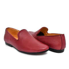 Bordo casual slip-on shoes showcasing the rich color and texture. Bordo casual slip-on shoes showcasing the rich color and texture.