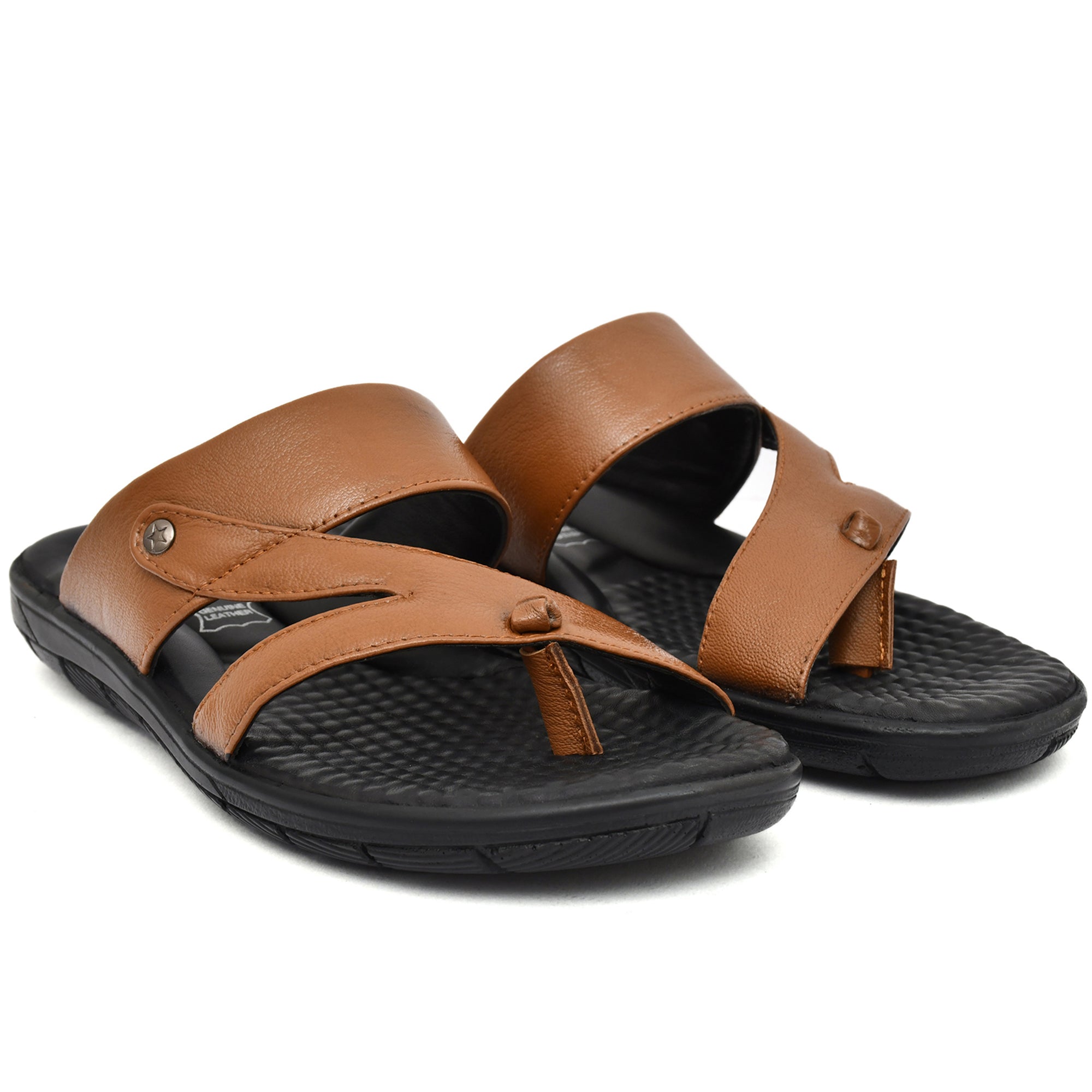 Tan leather slippers for men with a stylish slip-on design. Tan leather slippers for men with a stylish slip-on design.