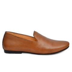 Side profile of tan leather slip-on shoes for men. Side profile of tan leather slip-on shoes for men.