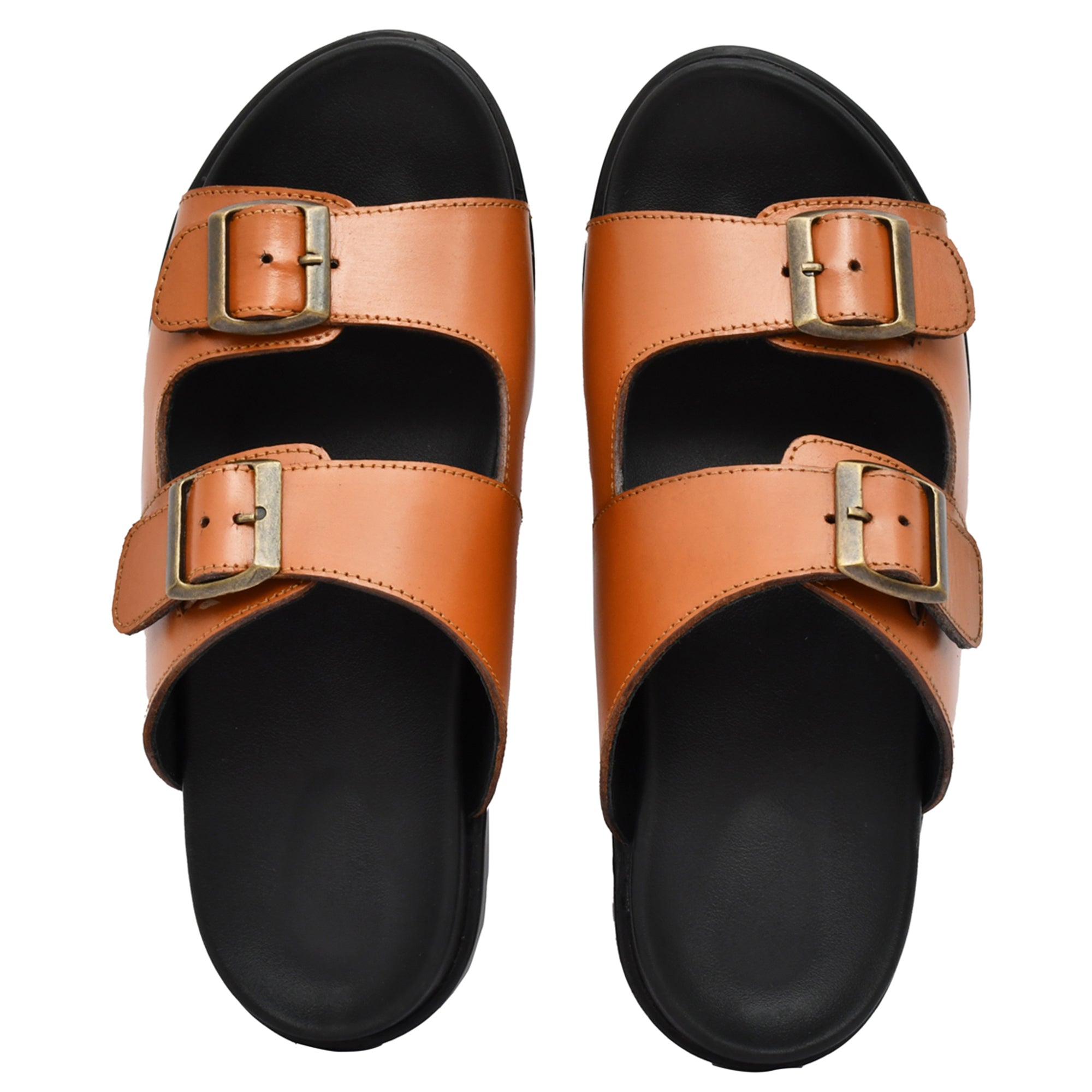 Elegant tan leather slippers from Country Maddox, ideal for lounging Elegant tan leather slippers from Country Maddox, ideal for lounging