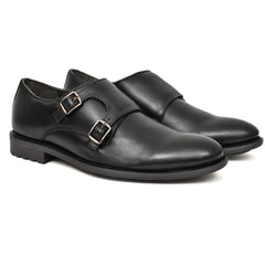 Close-up view of Country Maddox's Black Double Strap Monk Shoes showcasing metal buckles. Close-up view of Country Maddox's Black Double Strap Monk Shoes showcasing metal buckles.