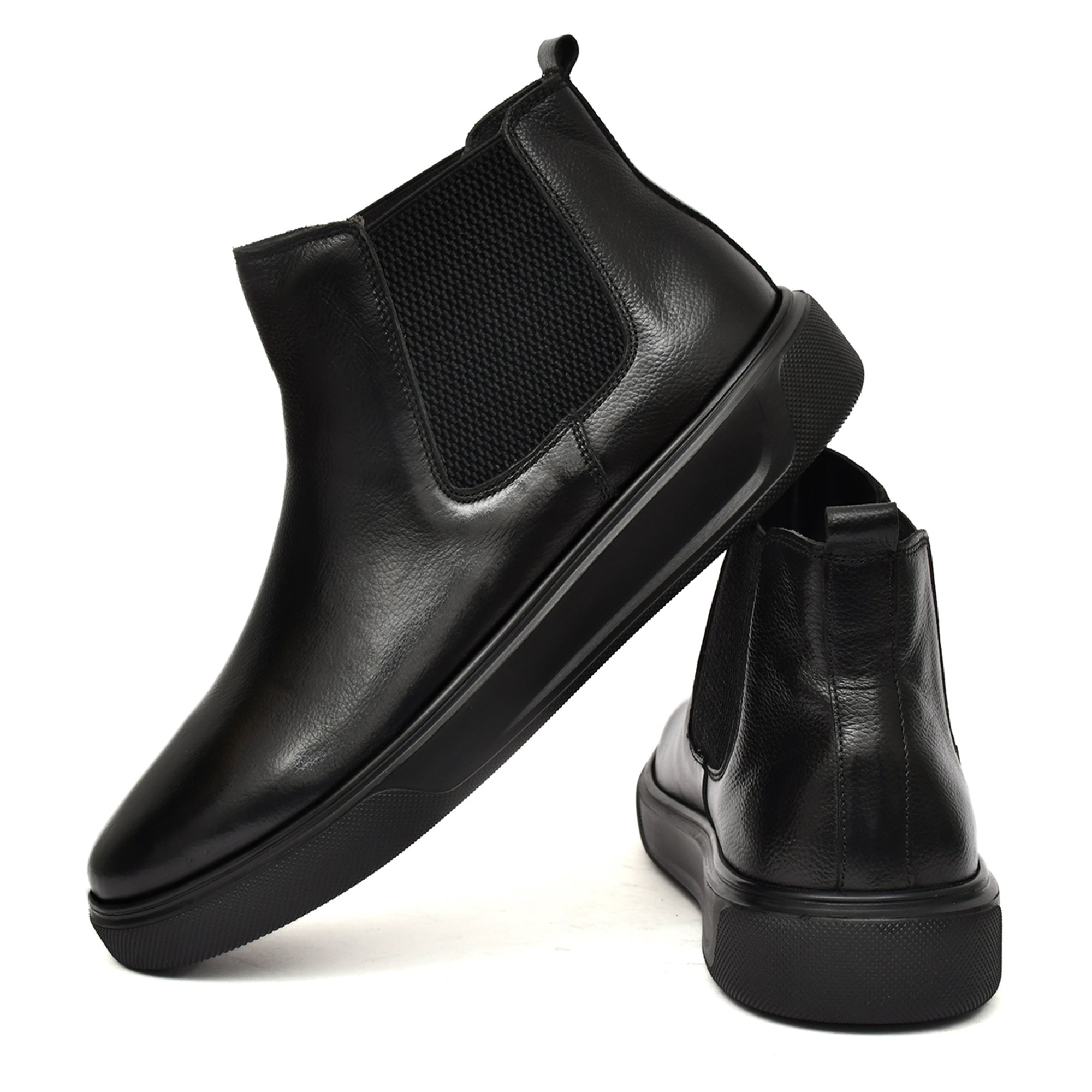 Stylish leather boot with an edgy twist, crafted for durability Stylish leather boot with an edgy twist, crafted for durability