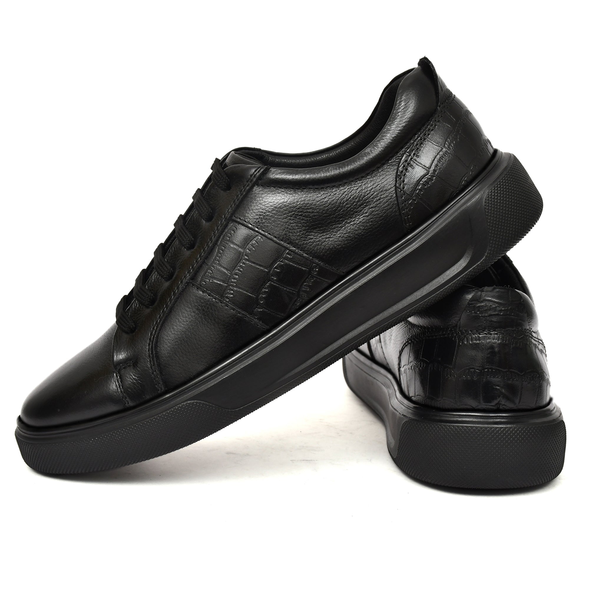 Durable and sleek black leather sneakers, perfect for any occasion Durable and sleek black leather sneakers, perfect for any occasion