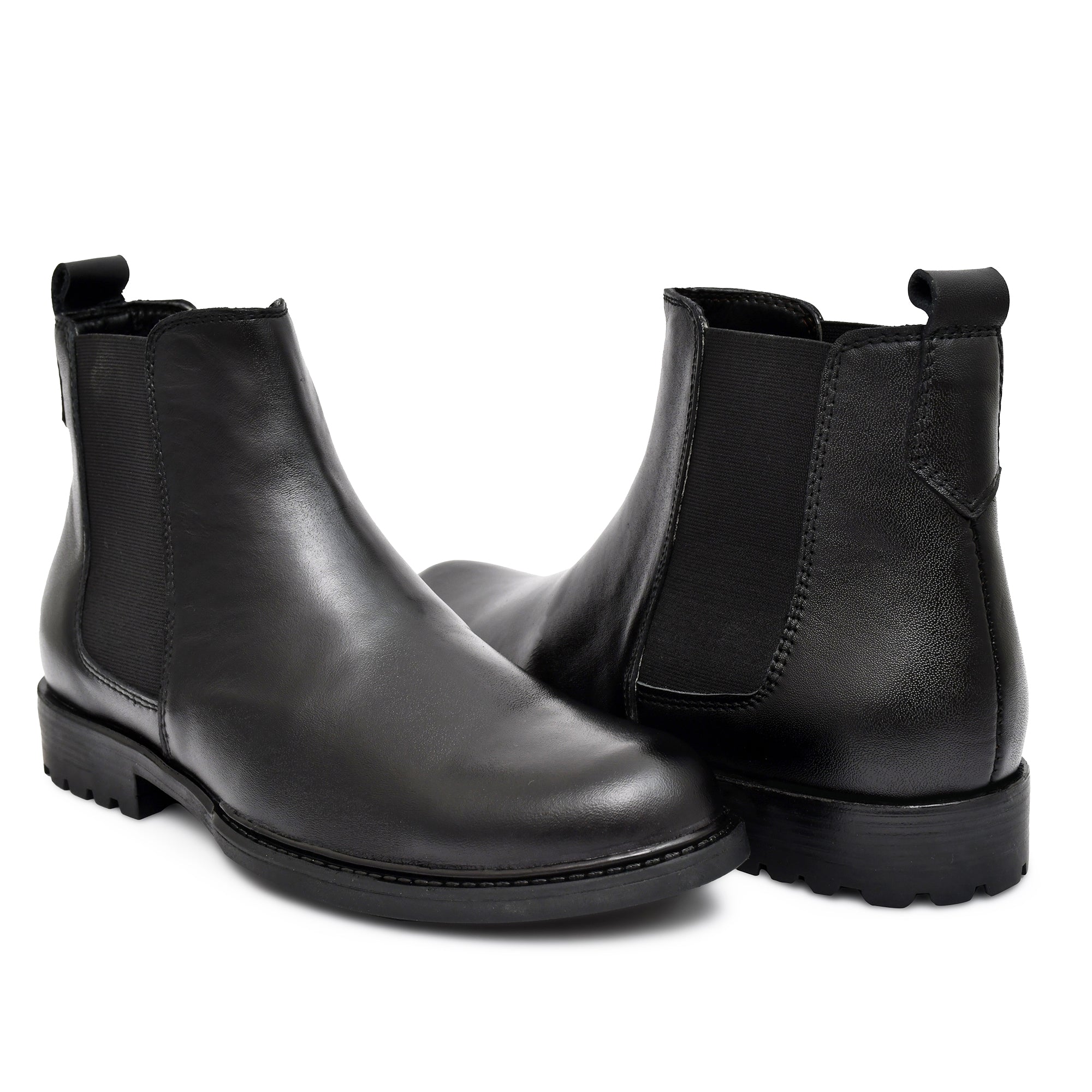 Elegant black leather boots featuring sturdy construction and timeless design. Elegant black leather boots featuring sturdy construction and timeless design.