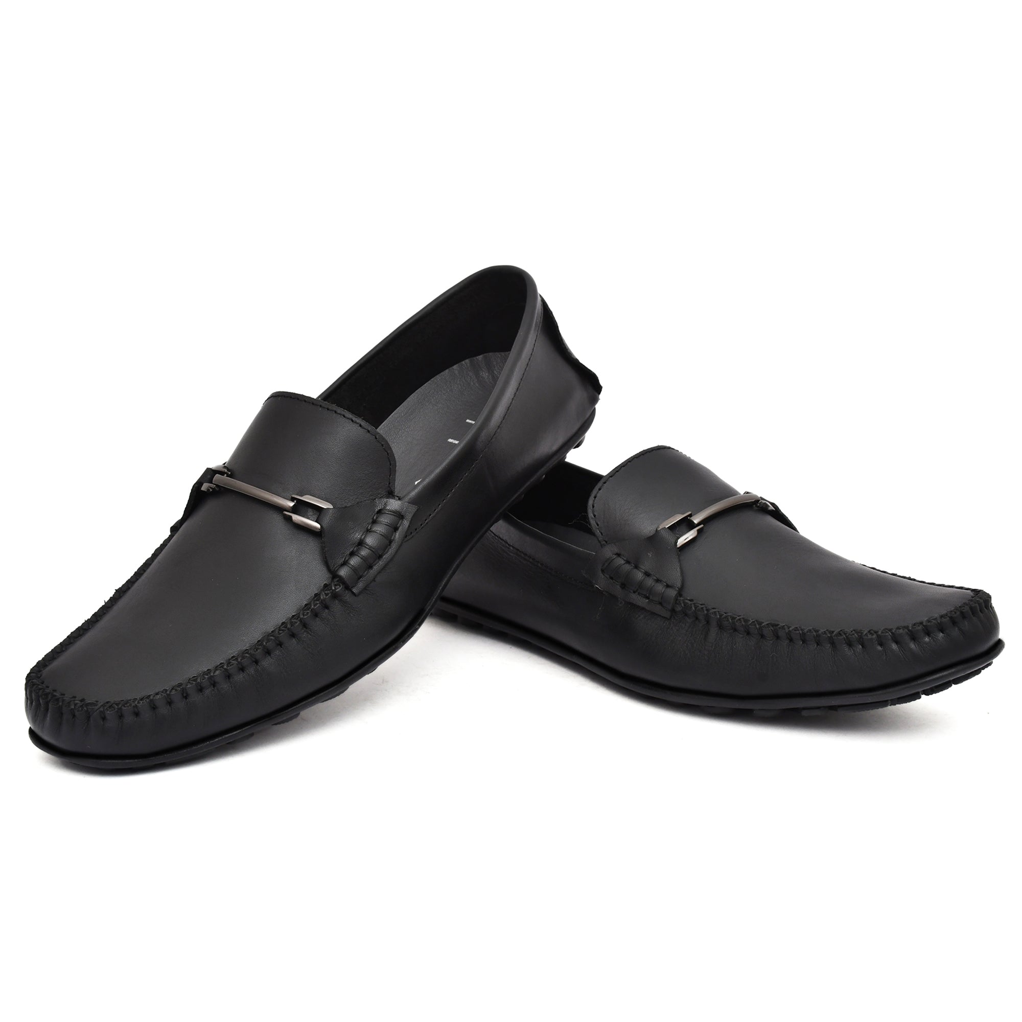 Close-up of stylish buckle detailing on Country Maddox Black Leather Loafers Close-up of stylish buckle detailing on Country Maddox Black Leather Loafers