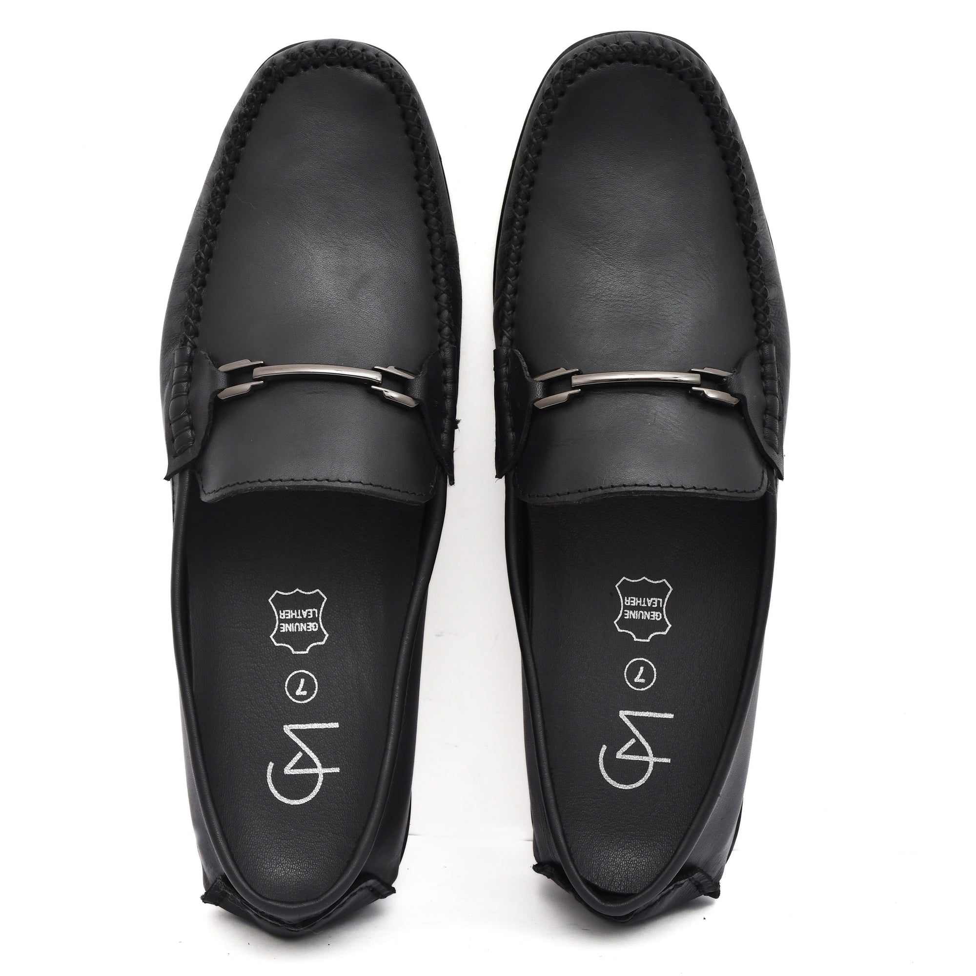 Top-down view of Country Maddox Black Leather Loafers on a white 
floor Top-down view of Country Maddox Black Leather Loafers on a white 
floor