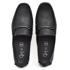 Top-down view of Country Maddox Black Leather Loafers on a white 
floor Top-down view of Country Maddox Black Leather Loafers on a white 
floor