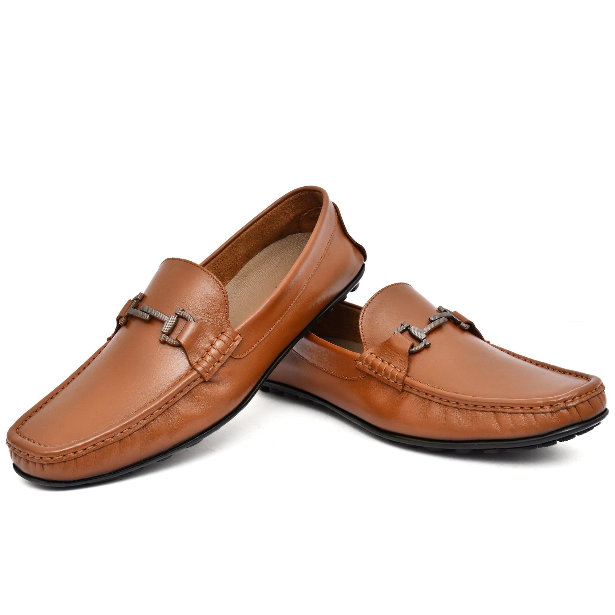 Close-up of the buckle fastening on Country Maddox Tan Leather Loafers, emphasizing secure fit and stylish details. Close-up of the buckle fastening on Country Maddox Tan Leather Loafers, emphasizing secure fit and stylish details.