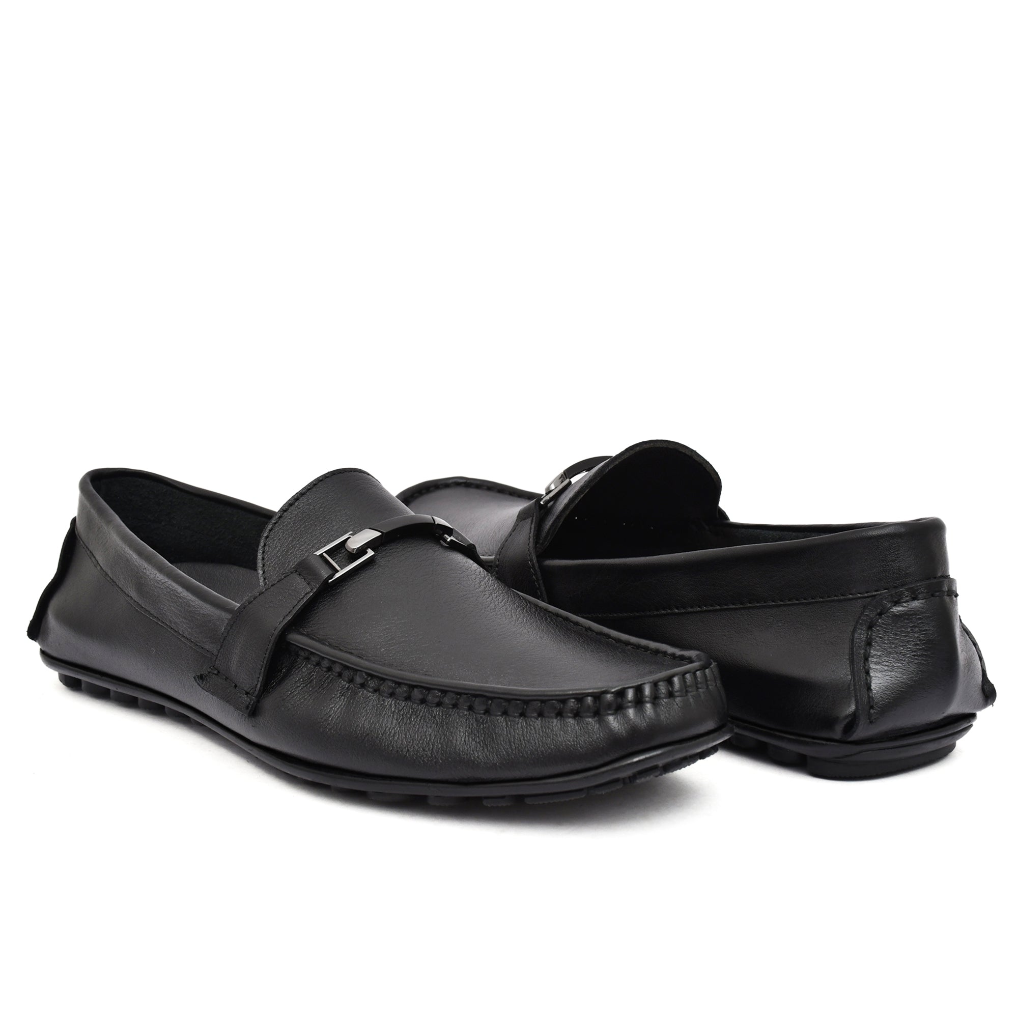 Close-up of the buckle detail on Country Maddox Black Leather Loafers, emphasizing quality craftsmanship. Close-up of the buckle detail on Country Maddox Black Leather Loafers, emphasizing quality craftsmanship.
