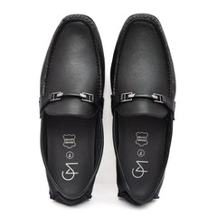 Styled shot of black leather loafers paired with casual outfit, perfect for versatile occasions. Styled shot of black leather loafers paired with casual outfit, perfect for versatile occasions.