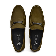 Men's buckled loafers paired with formal attire for a sophisticated look. Men's buckled loafers paired with formal attire for a sophisticated look.