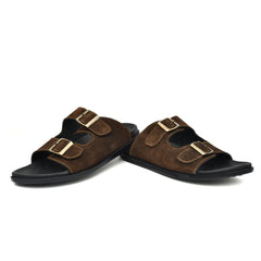 Elegant brown leather slippers featuring a slip-on design for easy wear. Elegant brown leather slippers featuring a slip-on design for easy wear.