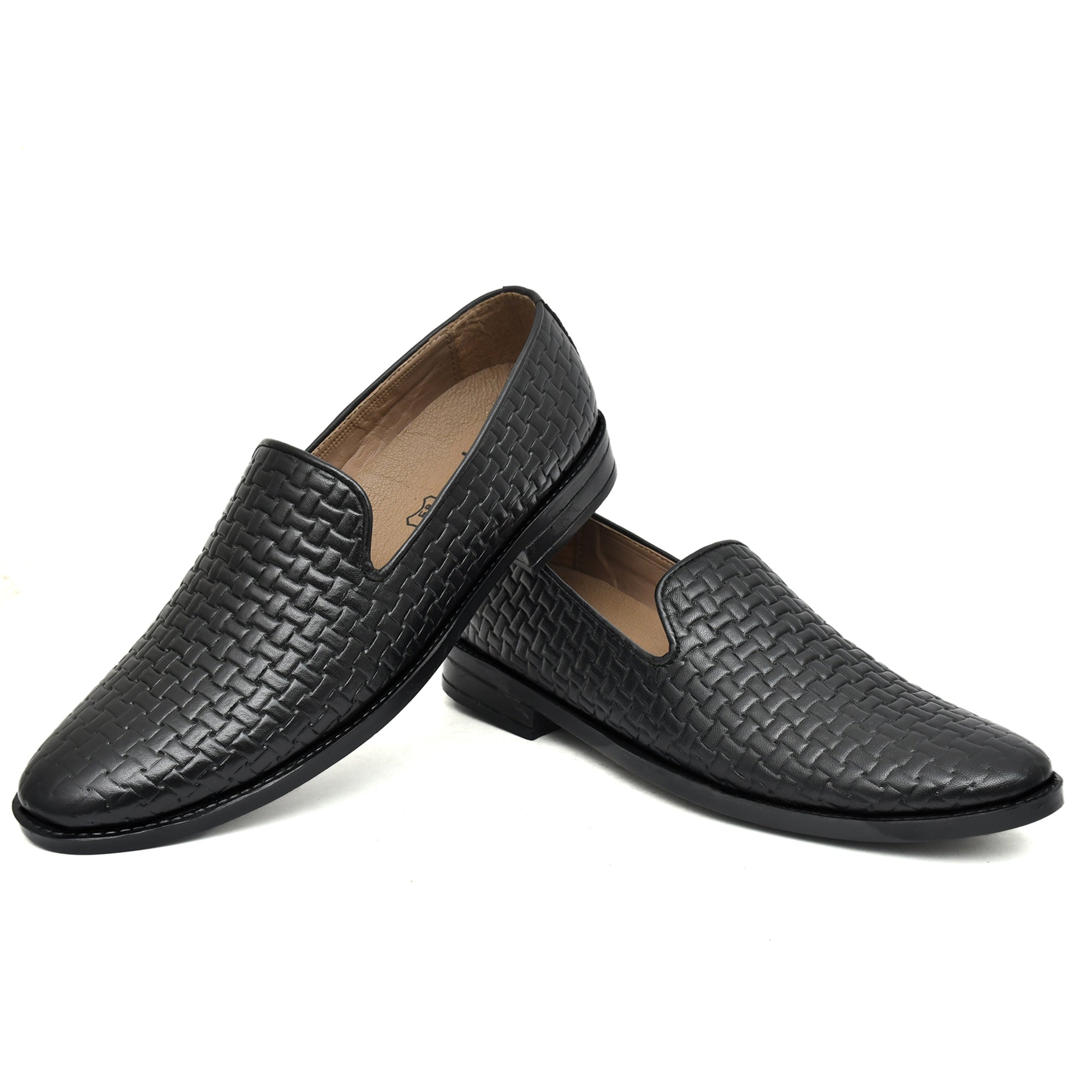 Black leather slip-on shoes for men showcasing timeless style and comfort. Black leather slip-on shoes for men showcasing timeless style and comfort.