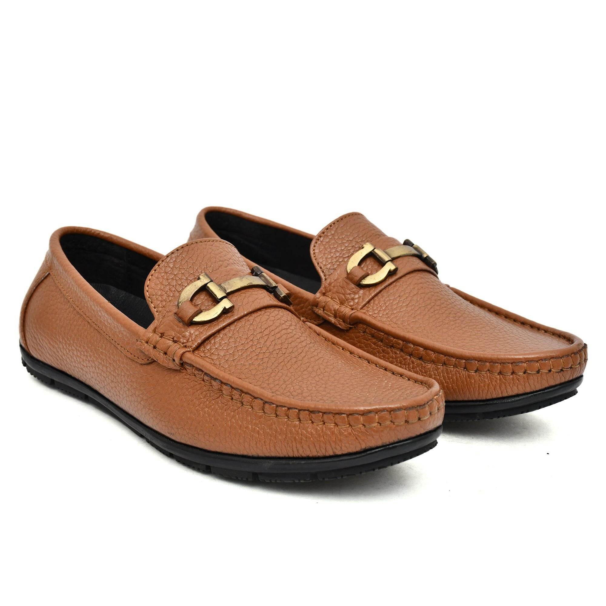 Close-up view of buckle detail on Country Maddox tan leather loafers. Close-up view of buckle detail on Country Maddox tan leather loafers.