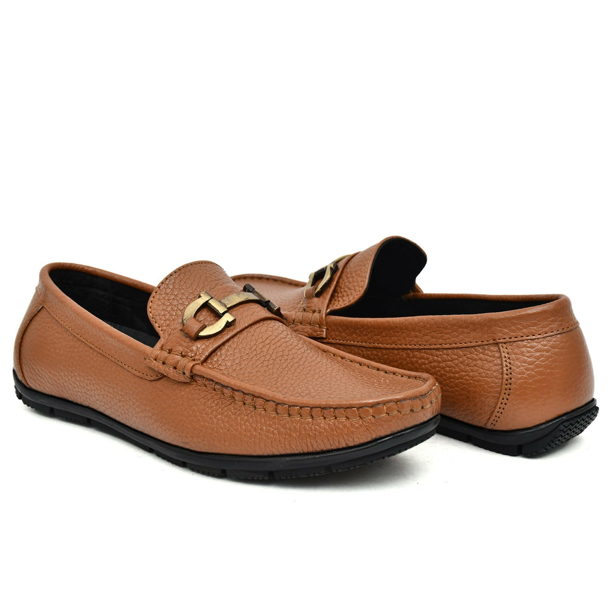 Man styling tan leather loafers with a formal outfit. Man styling tan leather loafers with a formal outfit.