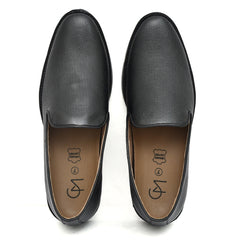 Black leather slip-ons with a sleek design and comfortable fit. Black leather slip-ons with a sleek design and comfortable fit.