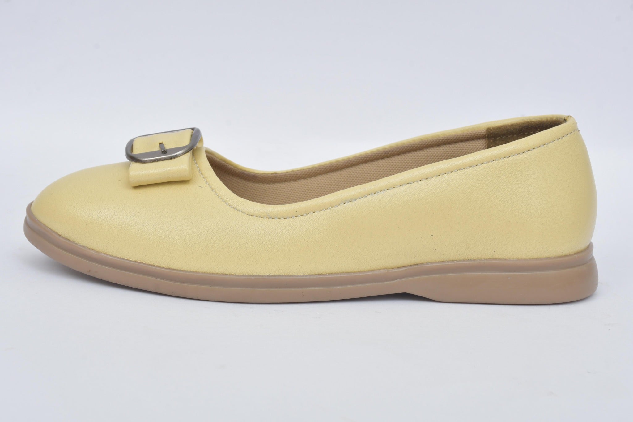 Women's off white ballerina flat, side view
