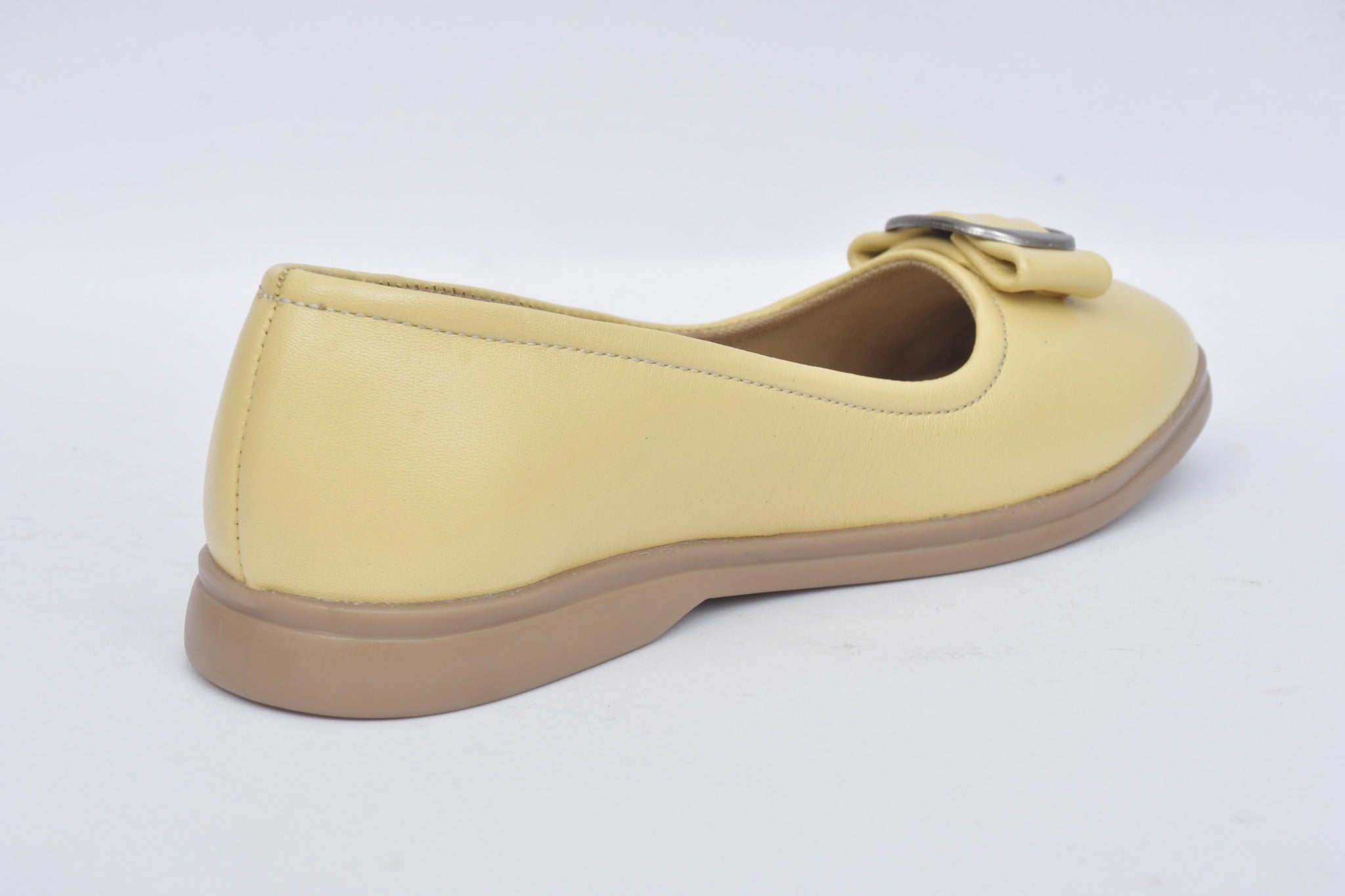 Women's off white ballerina flat, rear angle