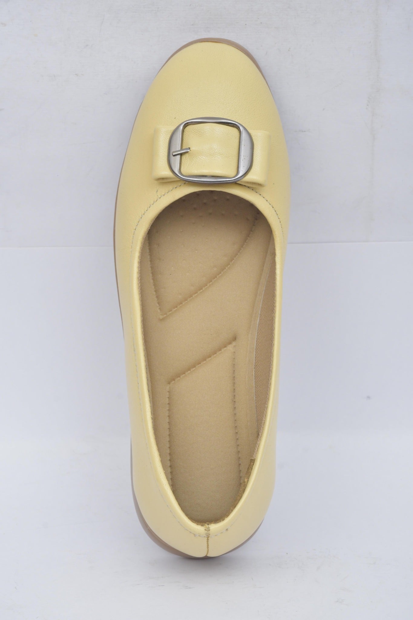 Women's off white buckle detail flat, top view