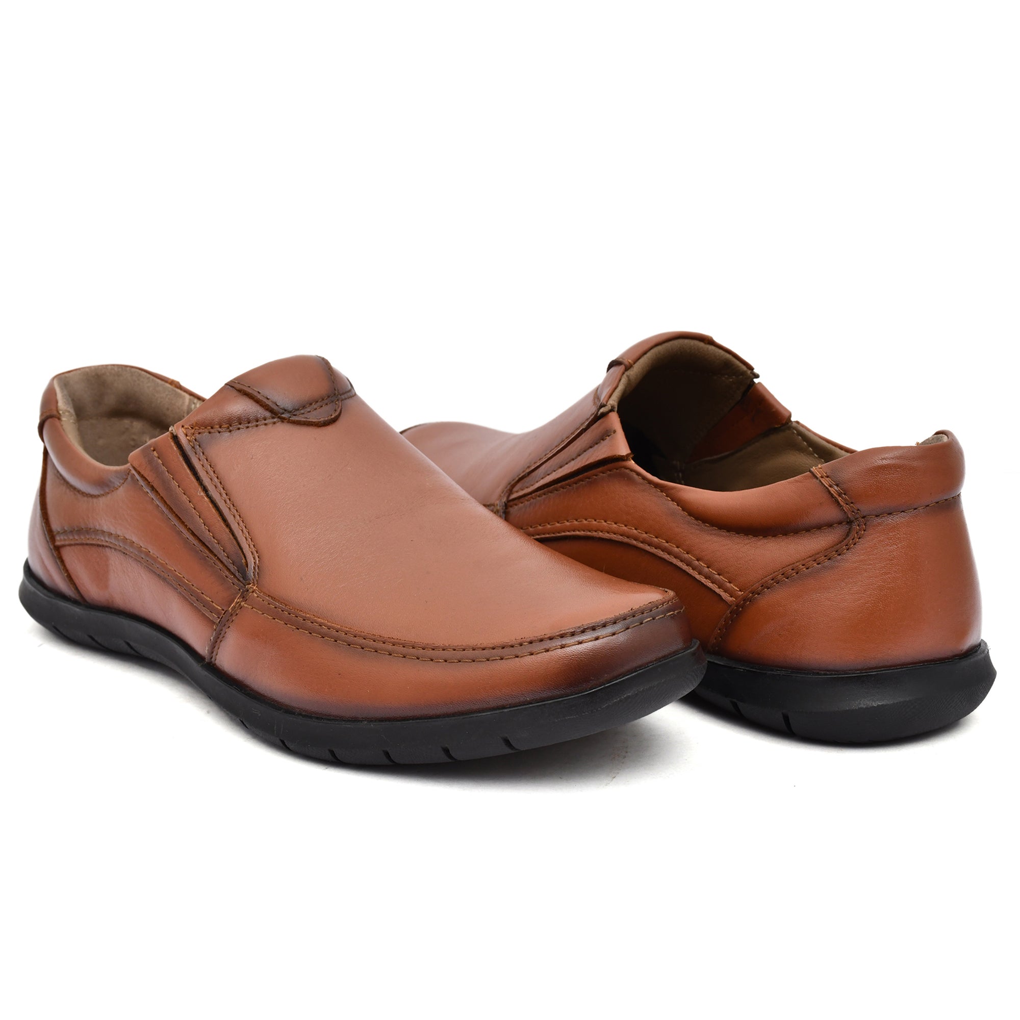 Casual slip-on shoes in tan color against a white background